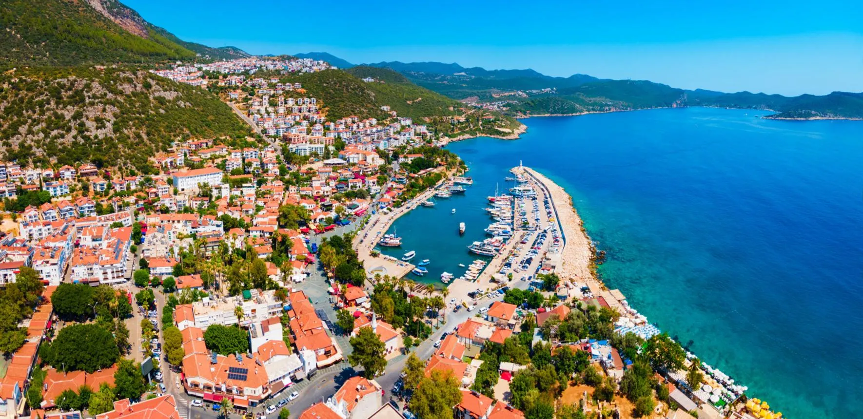 Kaş harbour, its white town and the long peninsula above the turquoise Mediterranean